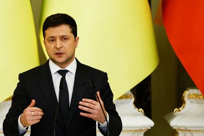 Ukraine's Zelenskiy warns of new iron curtain falling as Russian troops advance