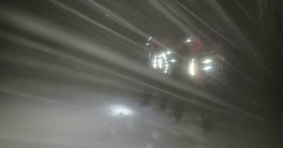 Three walkers rescued from Scots mountainside after becoming stranded in blizzard conditions