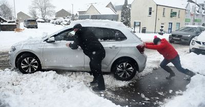 Police urge drivers to travel with 'extra caution' after Scotland is battered by thundersnow