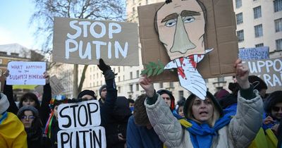 Furious protesters in London call for Boris Johnson to 'wake up and stop Putin now'