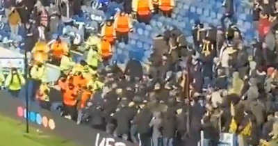 Fans clash at Rangers v Dortmund as police intervene and steward injured