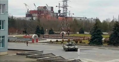 Moment Russian tanks roll into Chernobyl after battle to seize power plant