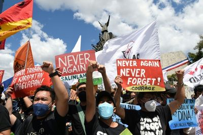 Philippine bishops, protesters: no return to Marcos-style rule