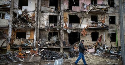 Horrifying photos show Kyiv buildings in ruins after Russian rocket strikes hit Ukraine capital overnight