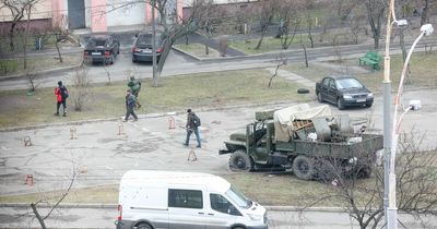 Tanks roll through Kyiv as Russian forces enter capital and gunfire heard near government buildings