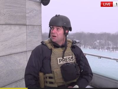 Sky News journalists forced to take cover live on air as Ukrainian city ‘encircled’ by Russian troops