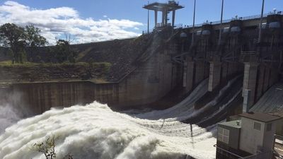 Brisbane's rapidly rising Wivenhoe Dam releases water amid south-east Queensland rain deluge