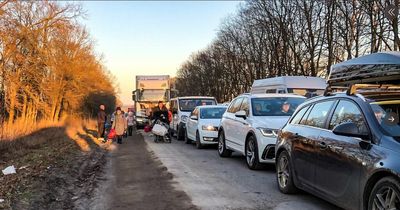 Ukrainian men 'conscripted on the spot' as refugees undertake 43-mile walk to Poland