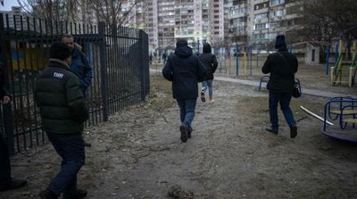 Fighting in Kyiv as Putin Calls for Ukraine Coup