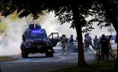 Tear-gassed protesters reach settlement with Richmond police