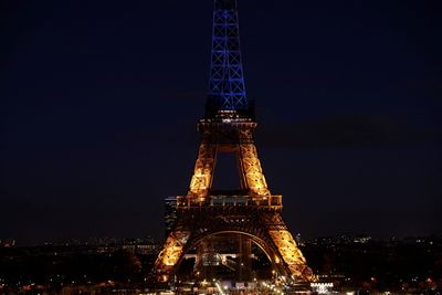 Paris' Eiffel Tower lights up in national colours of Ukraine