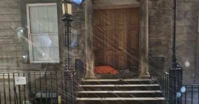 Man pictured sleeping in Glasgow doorway during heavy snow - how the public can help