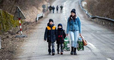 Inside terrifying evacuation of Kyiv as homes hit with missiles and Russia inches closer