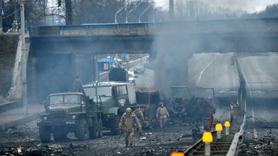 As it happened: Kyiv under curfew as France, Germany pledge to arm Ukraine