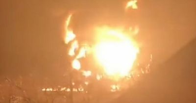 Huge fireball explodes in Ukrainian sky as Russian troops target fuel depot