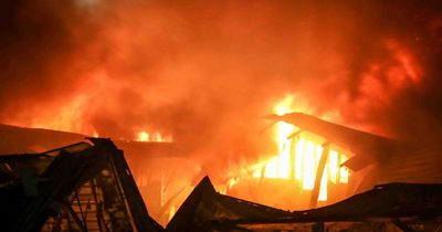 Cheadle fire: Huge blaze at storage facility as 130 firefighters battle building collapse