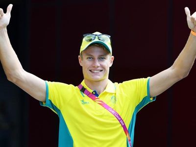 Hauser starts Comm Games tri push with win