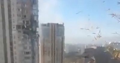 Spine-chilling moment missile strikes residential block in battle for Kyiv