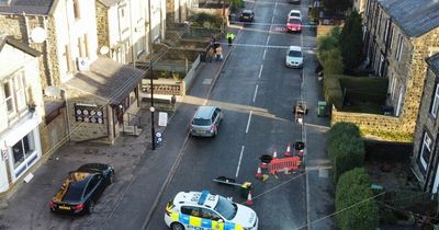 Morley street cordoned off and guarded by police after man attacked