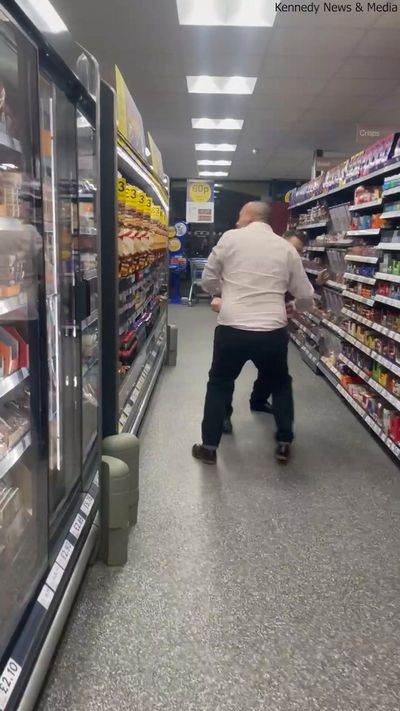 Hysterical video shows Tesco manager and tipsy customer in shop floor dance-off