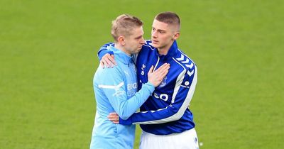 Ukraine duo Oleksandr Zinchenko and Vitaliy Mykolenko share moving pre-match embrace