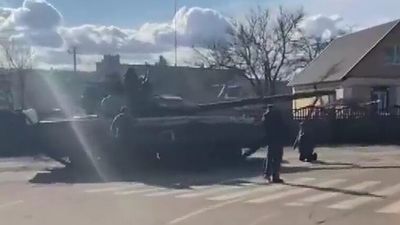 As Russian tanks roll in and bombs rain down, Ukrainians urge resistance on social media