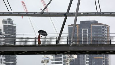 What's causing all this rain in south-east Queensland and how does it stack up with past flooding?