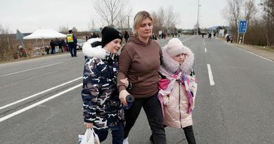 Ukrainian mum in tears as she's reunited with her children at the border