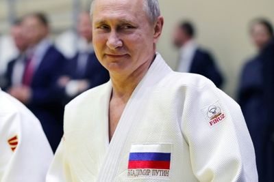 International Judo Federation suspends Putin as honorary president