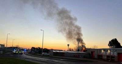 Fire crews tackle massive blaze at Scots industrial estate as thick black smoke fills the sky