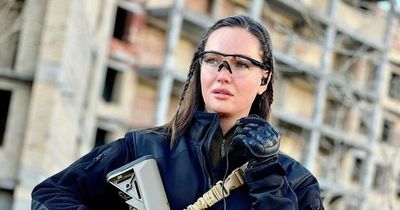 Former Miss Grand Ukraine takes up guns to fight off invading Russians
