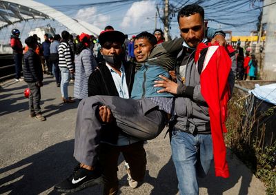 Nepal parliament debates U.S. grant amid protests