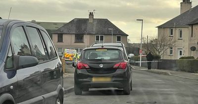 Two men rushed to hospital after being found injured on Scots street