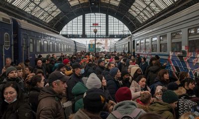 ‘Everyone was fighting to get on a train’: the desperation of Ukrainians trying to reach safety