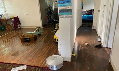 Queensland floods: clean-up begins for some Brisbane residents while others brace for river’s peak