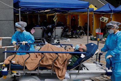 Hong Kong mortuaries hit capacity as COVID deaths climb