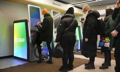 Russia’s central bank doubles interest rates and closes stock market as rouble plunges
