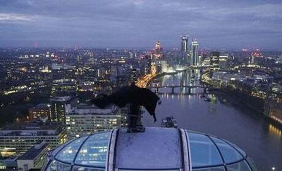 Batman stuntman stands on top of London Eye in daring promotion for new movie starring Robert Pattinson