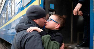 Dad's heartbreaking goodbye to son as family flees Ukraine and he stays to fight