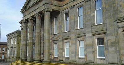 Lanarkshire yob spat at paramedics who had rushed to tower block to help him