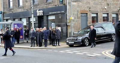 Final journey as people pay their respects to top hairdresser