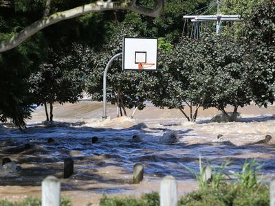 Two still missing in southeast Qld floods