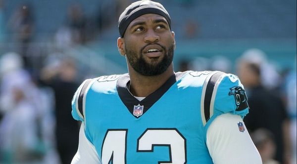 Panthers DE Brian Burns shows Haason Reddick his prize