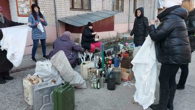 ‘Hello from Ukraine’: Volunteers make Molotov cocktails to counter Russian assault
