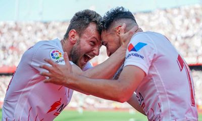 Sevilla seize their chance in derby to keep unlikely title hopes alive