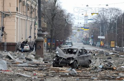 Russia bombards Ukraine urban areas as armed convoy stalls