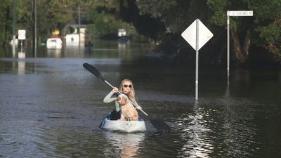 First death of NSW flood crisis confirmed as woman's body found in flooded Lismore home, Ballina Hospital evacuated