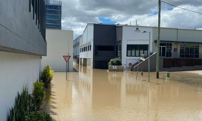 Brisbane flood: residents assess damage to homes as clean-up efforts begin