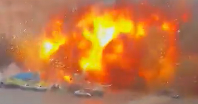 Moment huge fireball erupts as Russian missile hits Ukrainian government building in Kharkiv