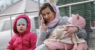 Heartbreaking images as child refugees arrive in Poland after fleeing Russian invasion